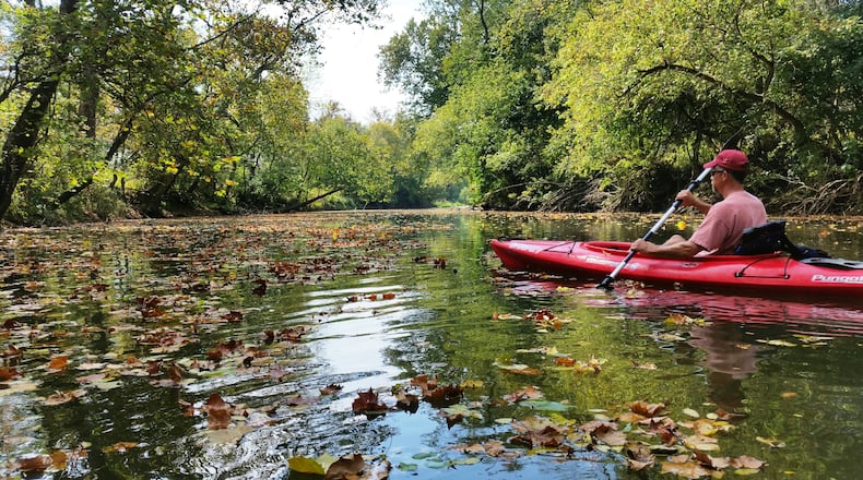 Little Miami Conservancy board member Rhett Rohrer paddles the Little Miami River near Beavercreek.