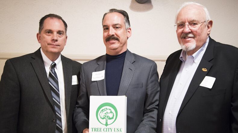 Michael Howe, 88th Civil Engineer Group deputy director (center), represented Wright-Patterson Air Force Base during a Tree City USA recognition ceremony in Miamsburg, April 20. Wright-Patterson AFB has been a Tree City USA community for the past 21 years. (U.S. Air Force photo/Jim Varhegyi)