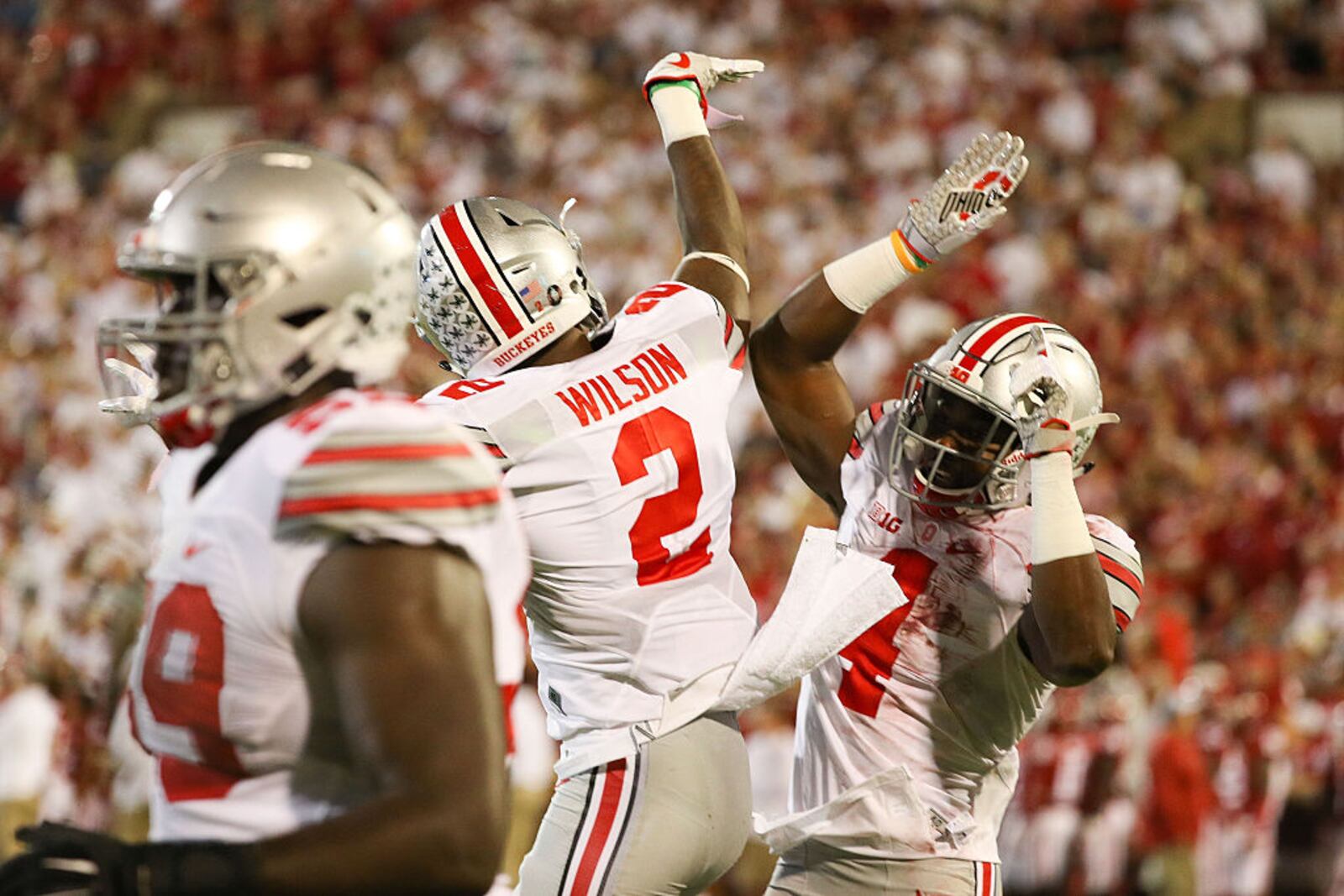 NORMAN, OK - SEPTEMBER 17: Curtis Samuel #4 of the Ohio State Buckeyes celebrates after his touchdown with Dontre Wilson #2 at Gaylord Family Oklahoma Memorial Stadium on September 17, 2016 in Norman, Oklahoma. (Photo by Scott Halleran/Getty Images)