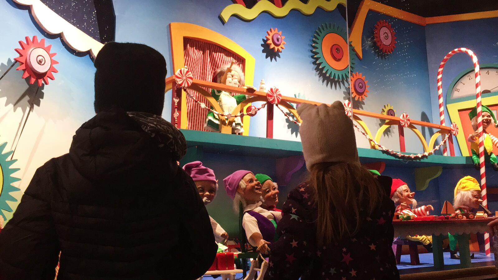 Kids of all ages take in the Wonderland Window displays in the Wintergarden of the Schuster Center in downtown Dayton. (TABATHA WHARTON)