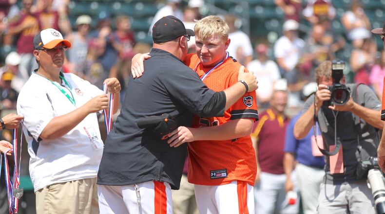 Coldwater receives state runner-up medals after a loss to South Range in the Division III state championship game on Saturday, June 2, 208, at Huntington Park in Columbus.