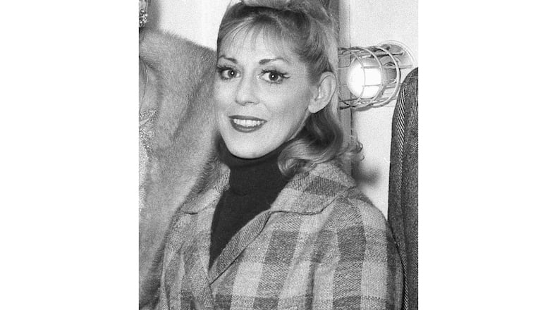 FILE - Sondra Lee, a cast member for the Broadway show "Hello Dolly1" appears backstage at the St. James Theater in New York on Oct. 14, 1964. (AP Photo/Harvey Lippman, File)