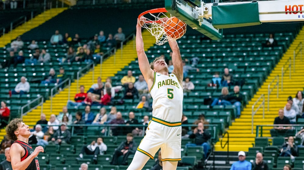 Alex Bruskotter dunks for two of his 15 points against Ohio Wesleyan on Thursday night at the Nutter Center. ALEXIS SHERMAN / CONTRIBUTED PHOTO