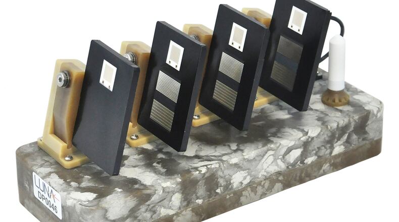 In conjunction with Luna Inc. and engineers at the Air Force Corrosion Prevention and Control Office, researchers at the Air Force Research Laboratory have developed a new corrosion and coating evaluation system, CorRES, that can measure the ability of coatings to protect aircraft structures by using sensor panels that measure localized changes during corrosion testing. Unlike conventional coating tests that rely on an expert’s visual evaluation of a test panel at the conclusion of a test cycle, the CorRES takes measurements throughout a coating’s test and transmits data in real-time to a base station for evaluation. (Courtesy photo)