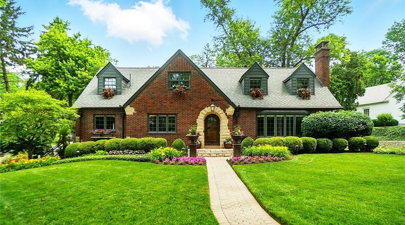 This brick Cape Cod style home has been recently updated and has extensive professional landscaping. It is the winner of the most recent Oakwood Beautification Award.