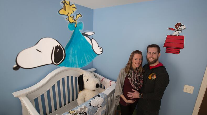 Caitlyn and Chris Lynd struggled to start a family for two years and were surprised that Chris' VA benefits did not cover medical treatments involving infertility. (John Konstantaras/Chicago Tribune/TNS)