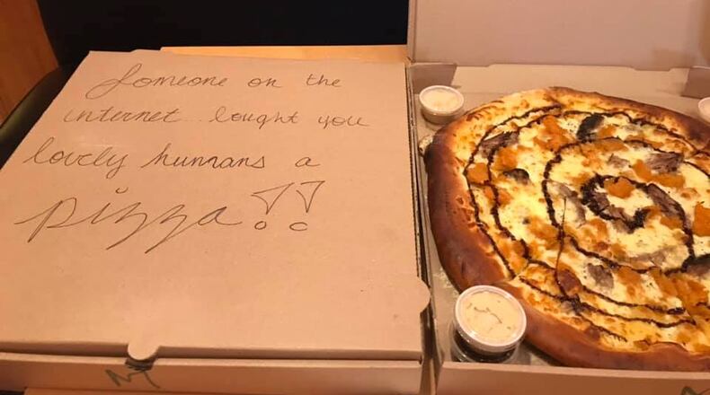 A special delivery sent to Meadowlark restaurant on Jan. 16 read "Someone on the internet bought you lovely humans a pizza!"