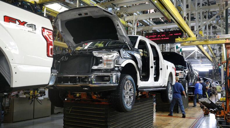 FILE PHOTO: Ford F150 trucks go through the assembly line at a Ford Plant. Plants around Detroit are starting to reopen after being close due to the coronavirus pandemic.