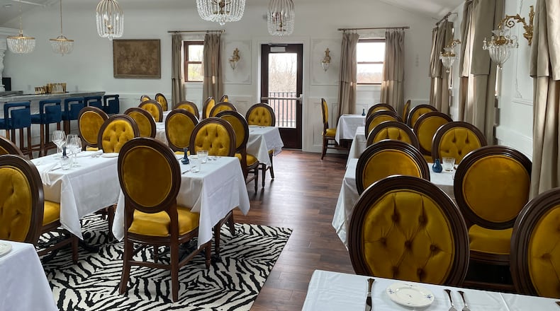 Manna, a fine dining restaurant with two bars, is holding a grand opening Saturday, May 20 at 61 W. Franklin St. in Centerville's historic Uptown neighborhood. NATALIE JONES/STAFF