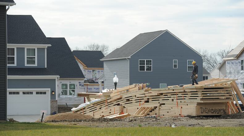 Carriage Trail homes is one of Huber Heights's largest new developments, with 135 permits filed for that development alone in 2021. Huber Heights has been rapidly growing for the past few years and several new developments have been proposed and built. Huber Heights saw the region's highest growth in new home permits, with 245 permits were filed for new homes in 2021, according to the Dayton Home Builders Association data. MARSHALL GORBY\STAFF