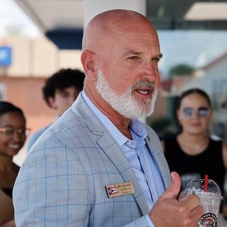 State Representative Bernie Willis speaks during a ribbon cutting ceremony for the new Seven Brew location at the intersection of East Main Street and Belmont Avenue in Springfield Tuesday, July 16, 2024. The new Seven Brew is the first in area. It offers hot and cold coffee drinks as well as energy drinks, milk shakes and smoothies. BILL LACKEY/STAFF