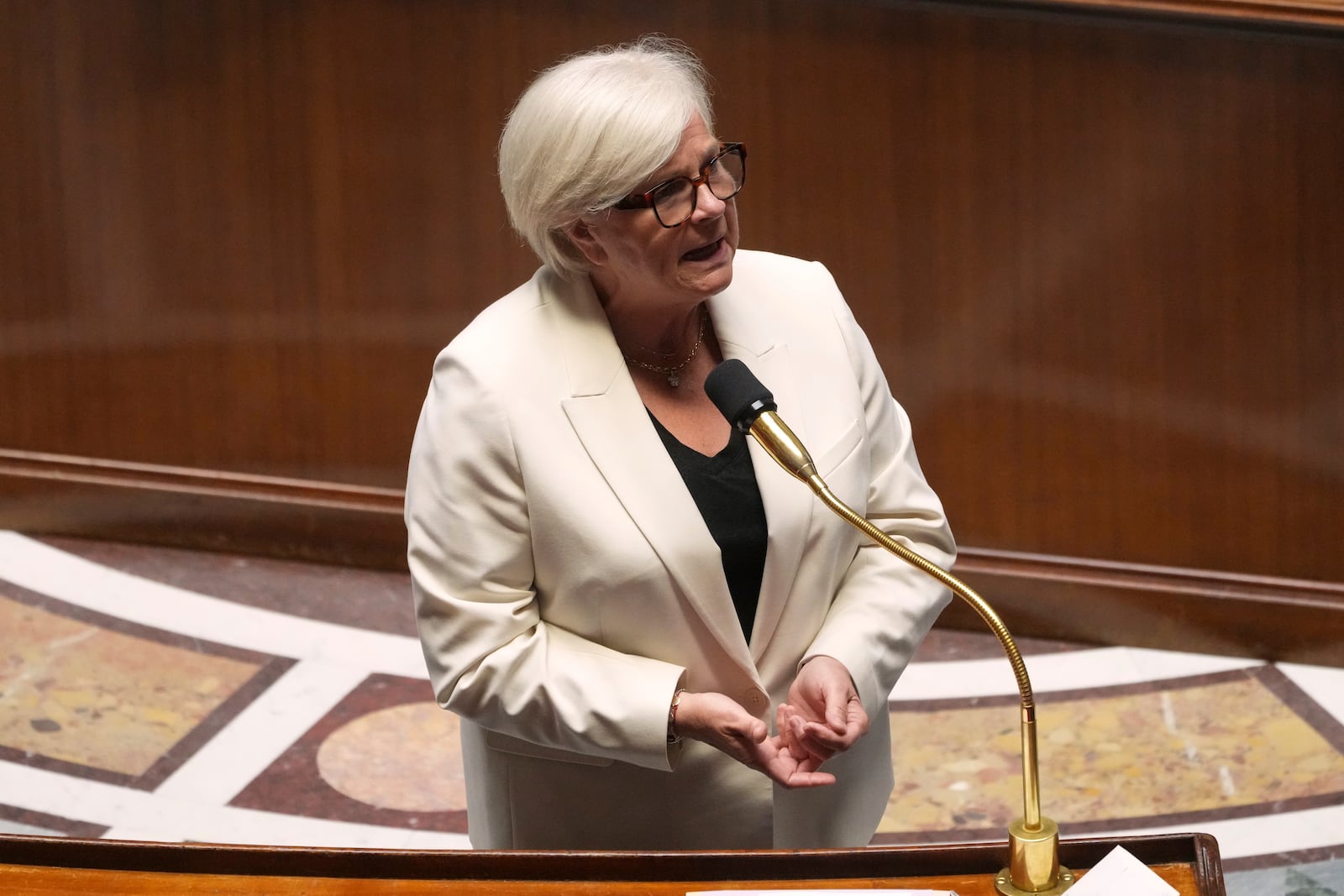 French Health Minister Catherine Vautrin speaks after France's lower house of parliament has adopted a bill to allow adults with incurable illness to take lethal medication, Tuesday, May 27, 2025 at the National Assembly in Paris. (AP Photo/Michel Euler)