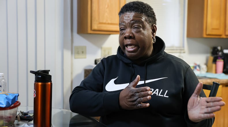 Kim Smith, of Dayton, went without health insurance for a number of years due to not qualifying for Medicaid and not being able to afford commercial health insurance. Now, Smith has been able to get on Medicaid, but the lack of health care when she did not have health insurance caused health issues to progress further than they would have if she had been able to afford annual doctor visits. BRYANT BILLING / STAFF