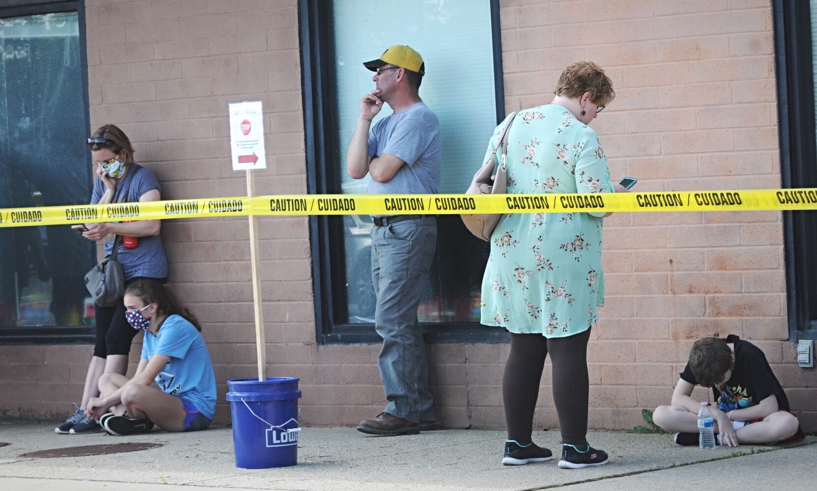 PHOTOS: Long lines as state BMV offices reopen after coronavirus shutdowns