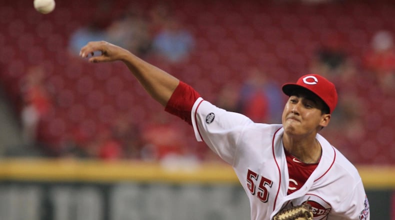 Reds starter Robert Stephenson pitches against the Rockies on Tuesday, April 19, 2016, at Great American Ball Park in Cincinnati. David Jablonski/Staff