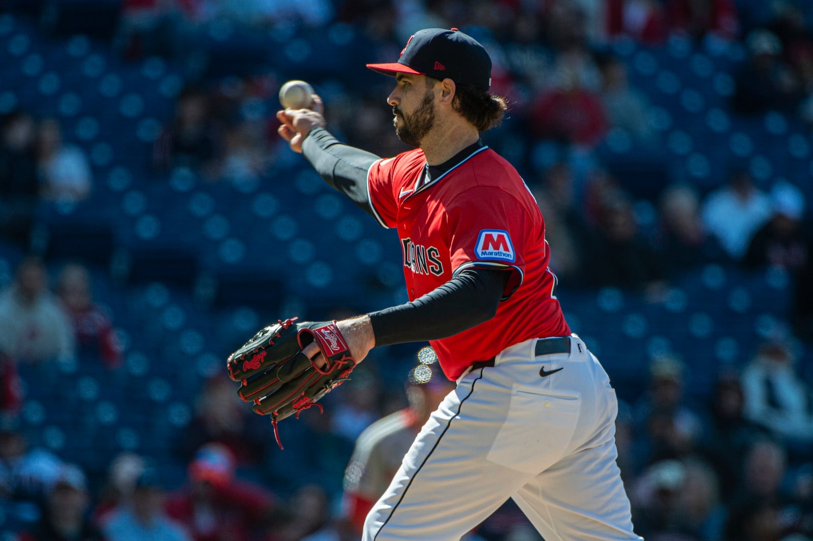 FILE - Cleveland Guardians catcher Austin Hedges fills in as a relief pitcher and delivers against the Boston Red Sox during the ninth inning of a baseball game Sunday, April 27, 2025, in Cleveland. (AP Photo/Phil Long, File)