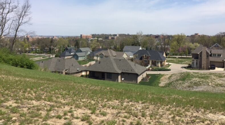 A look to the east from a hill overlooking the Pointe Oakwood housing development, in a photo taken in April 2017. To the west are the four Sugar Camp commercial buildings. THOMAS GNAU/STAFF