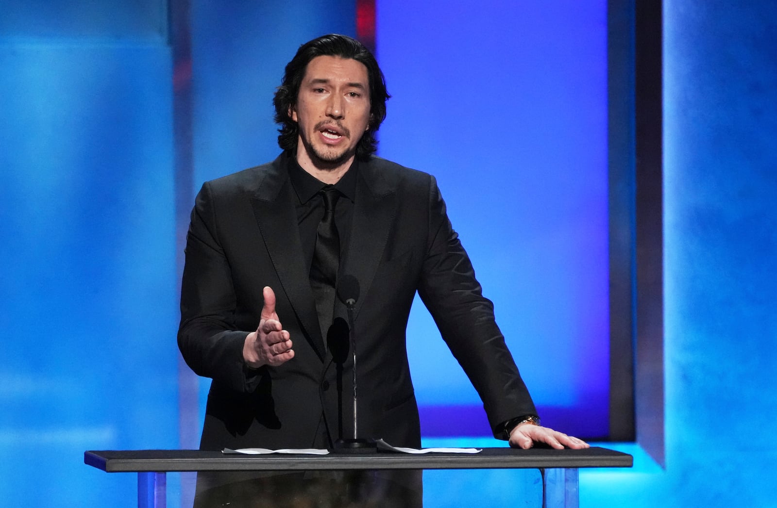 Actor Adam Driver addresses the audience during the 50th AFI Life Achievement Award tribute to Francis Ford Coppola on Saturday, April 26, 2025, at the Dolby Theatre in Los Angeles. (AP Photo/Chris Pizzello)