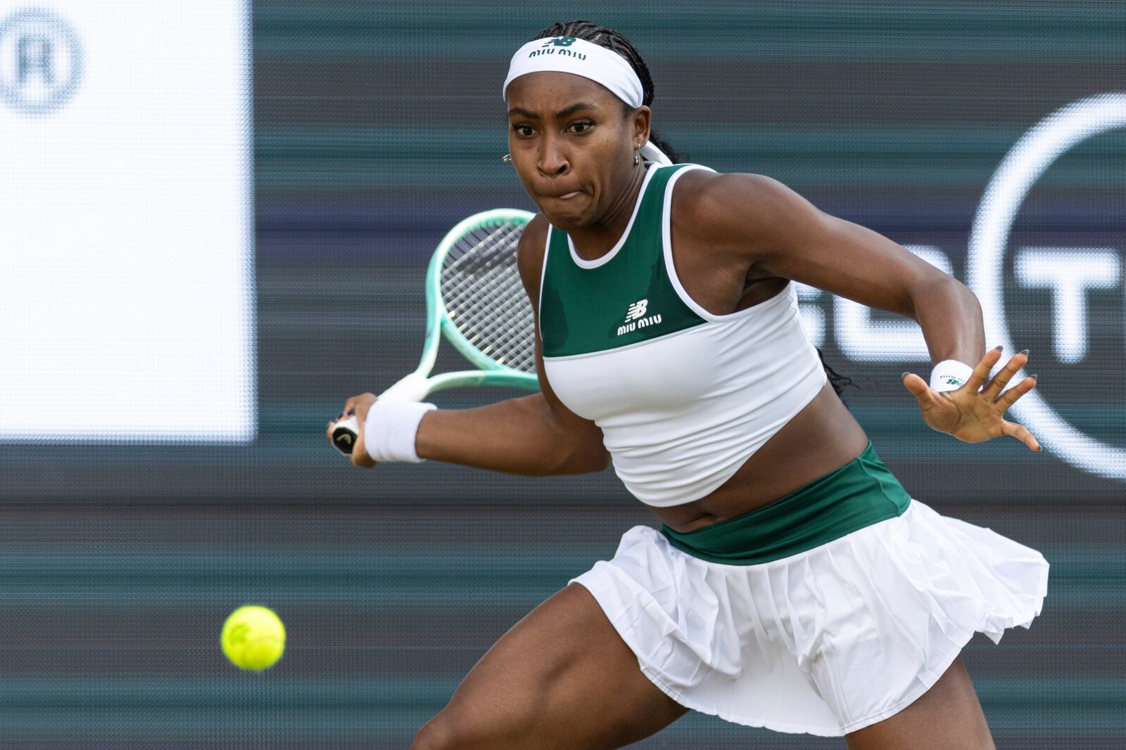 Coco Gauff of the United States returns the ball to China's Xinyu Wang during the Berlin WTA tennis tournament in Berlin, Germany, Thursday, June 19, 2025. (Hannes P. Albert/dpa via AP)