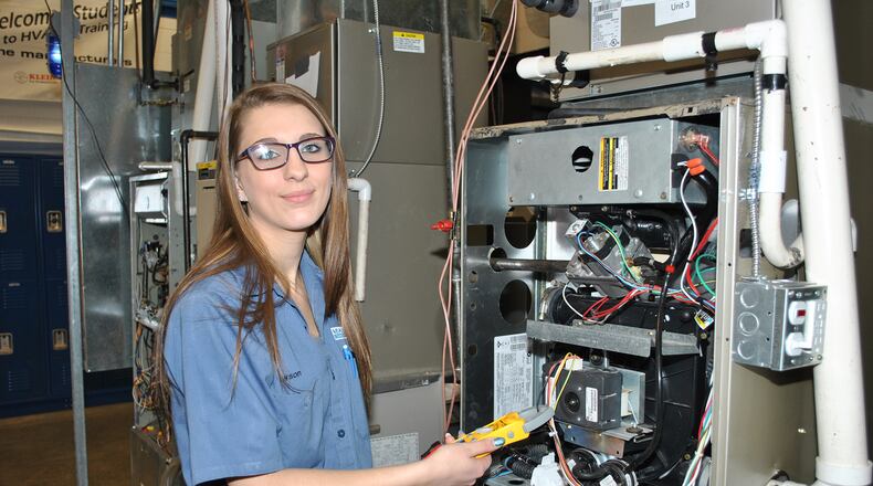 Alexia Dawson, a senior from Brookville in the Miami Valley Career Technology Center HVAC program, works for MSD in Dayton as part of the MVCTC pre-apprenticeship program. CONTRIBUTED PHOTO