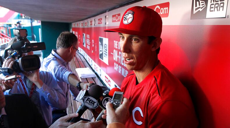 Pitcher Michael Lorenzen speaks to reporters in the Reds dugout on Tuesday, April 28, 2015, at Great American Ball Park in Cincinnati. David Jablonski/Staff