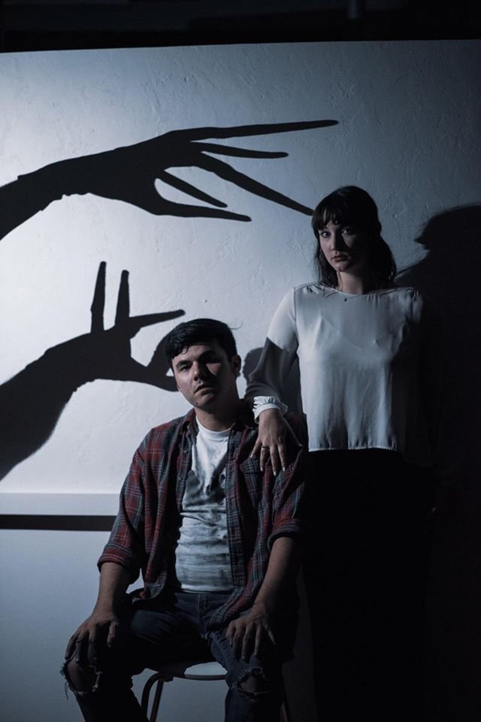 Rae Buchanan (Anna) and A.J. Breslin (Matt) confront their fears in Playground Theatre’s local premiere of “The Feast” Oct. 25-28 in the PNC Arts Annex. CONTRIBUTED/KNACK CREATIVE