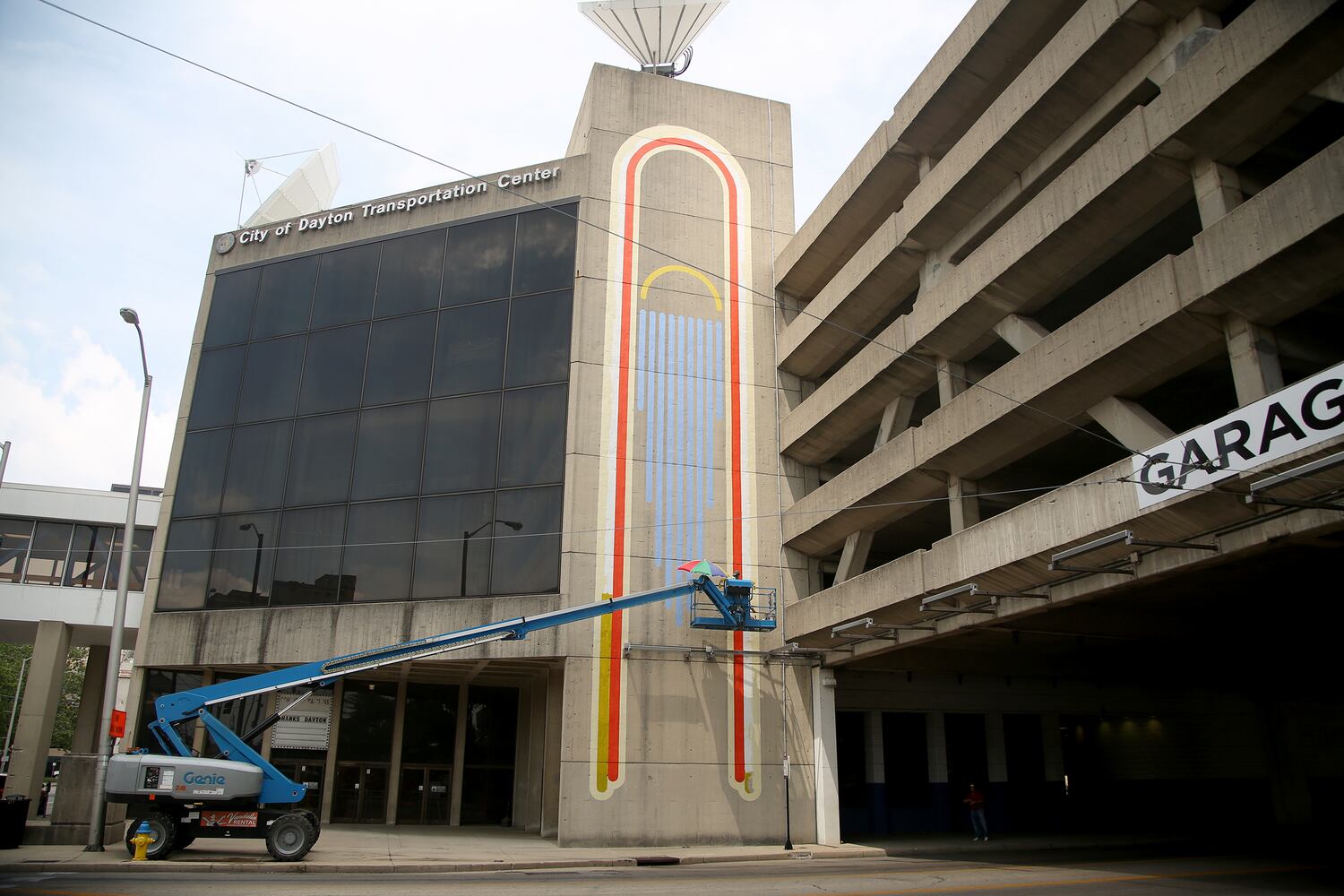 PHOTOS: New vibrant mural design energizes Dayton’s transportation center garage