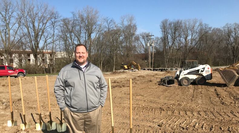 Harrison Twp. Administrator Kristofer McClintick stands in front of the construction site of a new Restaurant Depot store. KAITLIN SCHROEDER/STAFF