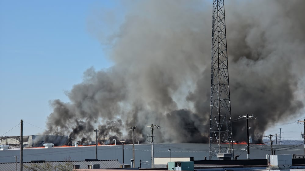 The fire at Fuyao Glass America rekindled shortly before noon on Tuesday, March 24. While firefighters have been working at the site since it first caught fire Sunday night, they had been focusing on hotspots before a large rekindling caused black smoke to rise that was visible for miles. The building that caught fire was Fuyao's coating facility, which was still in the finishing stages of construction. BRYANT BILLING / STAFF