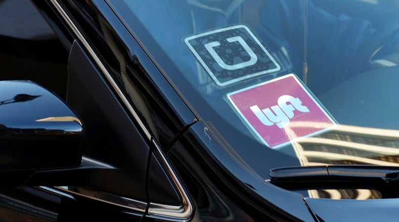 The safety of ride sharing services is being called into question. (AP Photo/Richard Vogel, File)