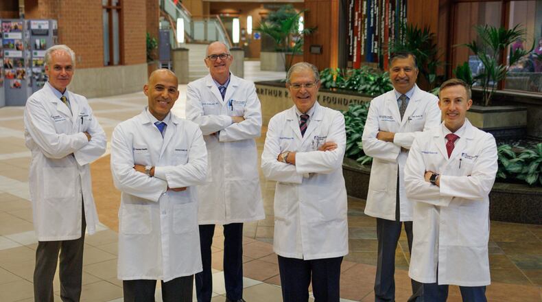 Pictured left to right: Dr. Robert Bulow, service line executive leader for Cardiovascular Service Line at Premier Health; Dr. Mouhamad Abdallah, medical director for Cardiac Cath Lab at Atrium Medical Center; Dr. Robert Dowling, surgical director of the Christ Hospital Health Network Heart Transplant Program; Dr. Dean Kereiakes, president of The Christ Hospital Health Network Heart & Vascular Institute; Dr. Amit Goyal, chair of the Premier Cardiology Institute; Dr. Thomas O’Brien, medical director of the Christ Hospital Health Network Heart and Vascular Institute. CONTRIBUTED