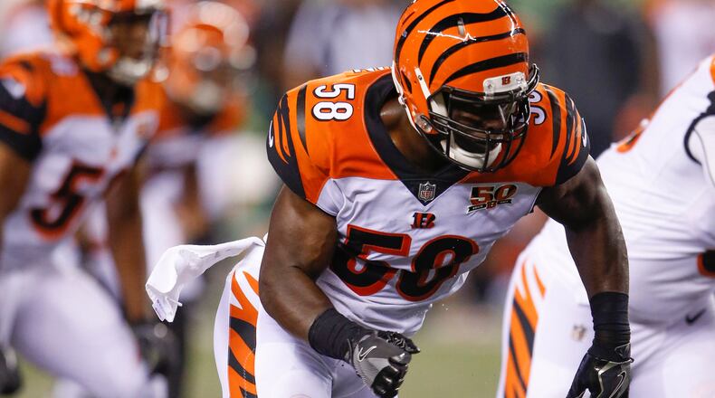 Cincinnati Bengals linebacker Carl Lawson runs a play in the first half of a preseason NFL football game Carl Lawson, Friday, Aug. 11, 2017, in Cincinnati. (AP Photo/Gary Landers)