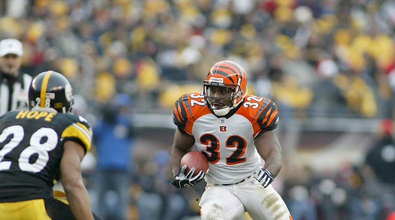PITTSBURGH, PA - DECEMBER 4: Rudi Johnson #32 of the Cincinnati Bengals runs against the Pittsburgh Steelers on December 4, 2005 at Heinz Field in Pittsburgh, Pennsylvania. (Photo by Rick Stewart/Getty Images)
