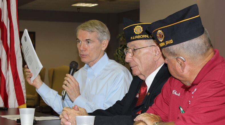 U.S. Sen. Rob Portman, R-Ohio, at a roundtable discussion with Dayton-area veterans to discuss the backlog of benefit claims and other problems with the Veterans health Administration in Fairborn in May 2014. FILE
