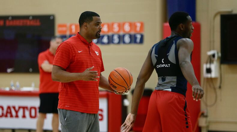 Dayton's Ricardo Greer coaches during a summer practice at the Cronin Center on Monday, Aug. 1, 2022, in Dayton. David Jablonski/Staff