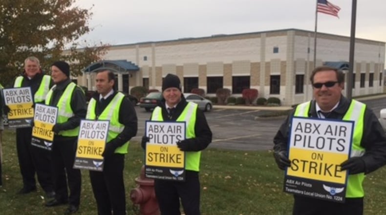 About 250 pilots who fly for the cargo carrier ABX Air, which operates flights for Amazon and DHL, went on strike in November 2016 in Wilmington. A judge ordered them back to work. CHUCK HAMLIN / STAFF