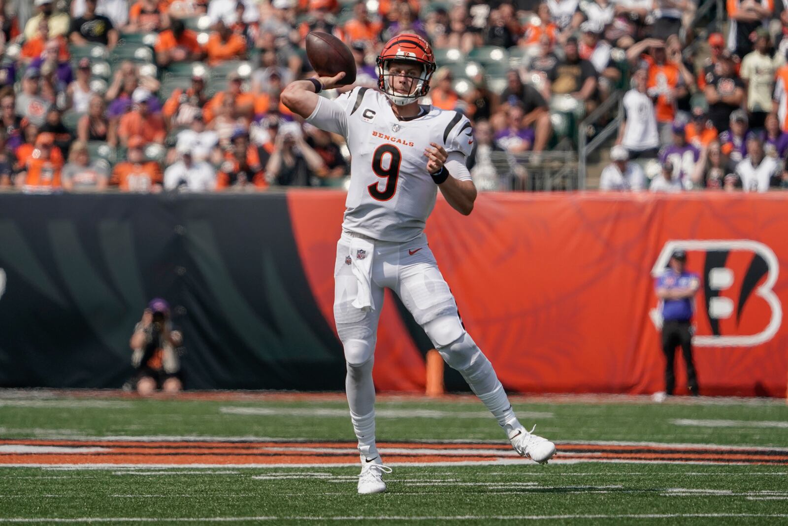 Cincinnati Bengals quarterback Joe Burrow (9) passes against the Minnesota Vikings during the second half of an NFL football game, Sunday, Sept. 12, 2021, in Cincinnati. (AP Photo/Jeff Dean)