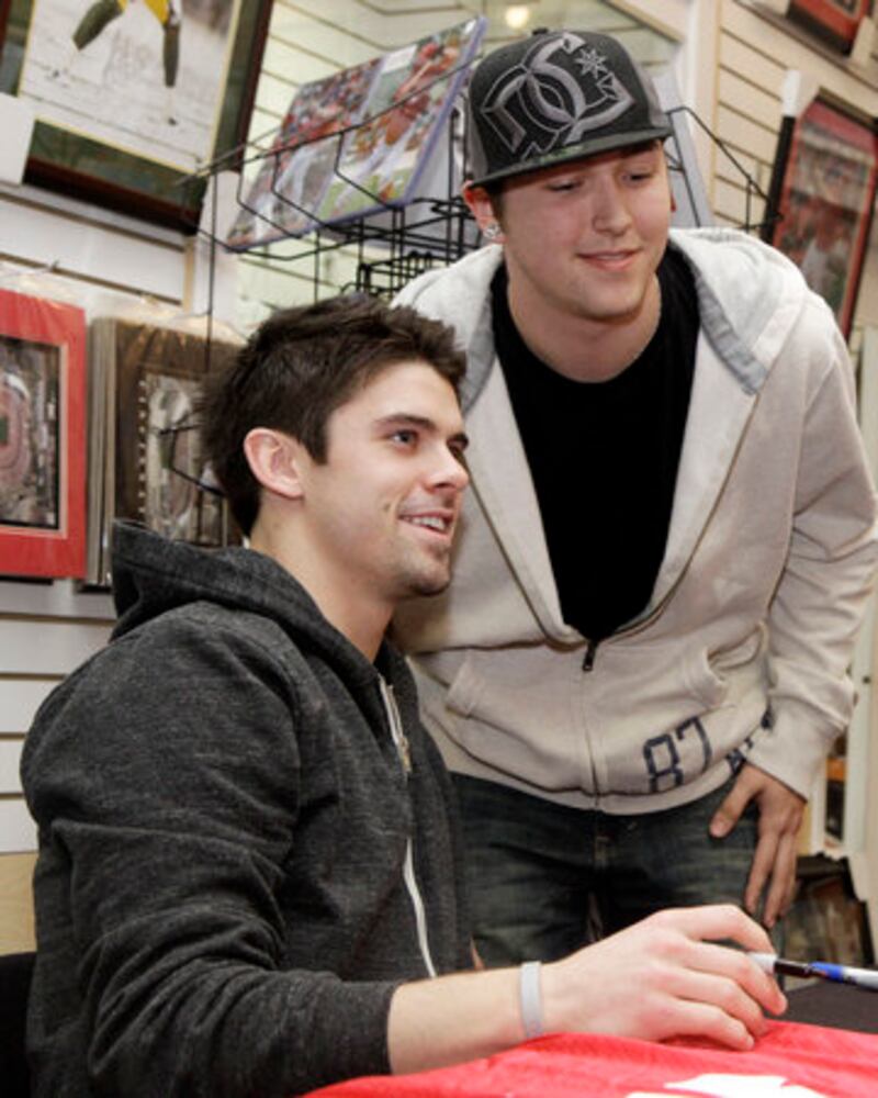OSU's Dane Sanzenbacher signs autographs