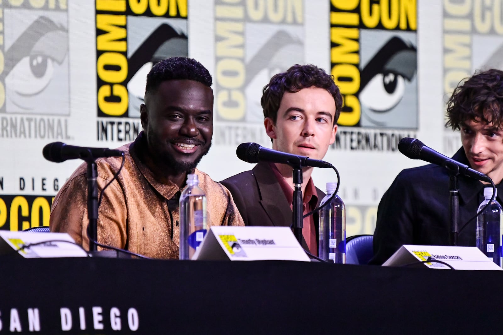 Babou Ceesay, from left, Alex Lawther, and Samuel Blenkin attend a panel for "Alien: Earth" during Comic-Con International on Friday, July 25, 2025, in San Diego. (Photo by Richard Shotwell/Invision/AP)