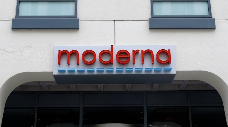 FILE - A sign marks an entrance to a Moderna building in Cambridge, Mass., May 18, 2020. (AP Photo/Bill Sikes, File)