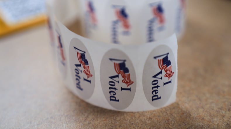 Labels reading "I Voted" are seen at the Orange County Registrar of Voters office in Santa Ana, Calif., on Wednesday, Oct. 29, 2025. (AP Photo/Damian Dovarganes)