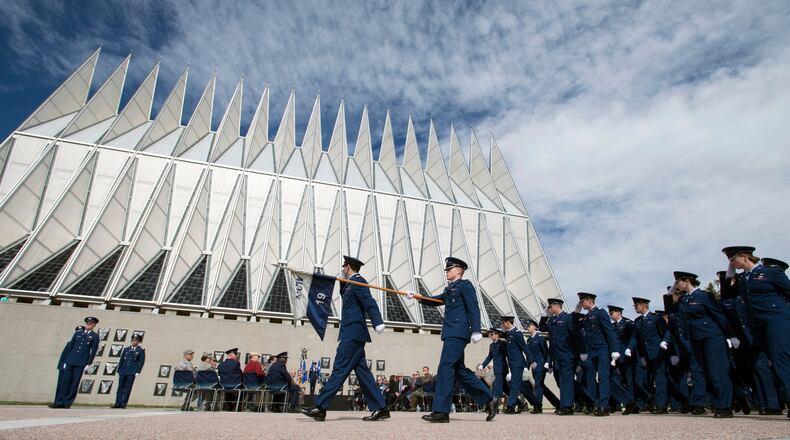 In this May 15, 2017 file photo, Air Force Academy Cadets pass in review after Brig. Gen. Kristin Goodwin assumed command of the AFA cadet wing at a ceremony at the Air Force Academy in Colorado Springs, Colo.