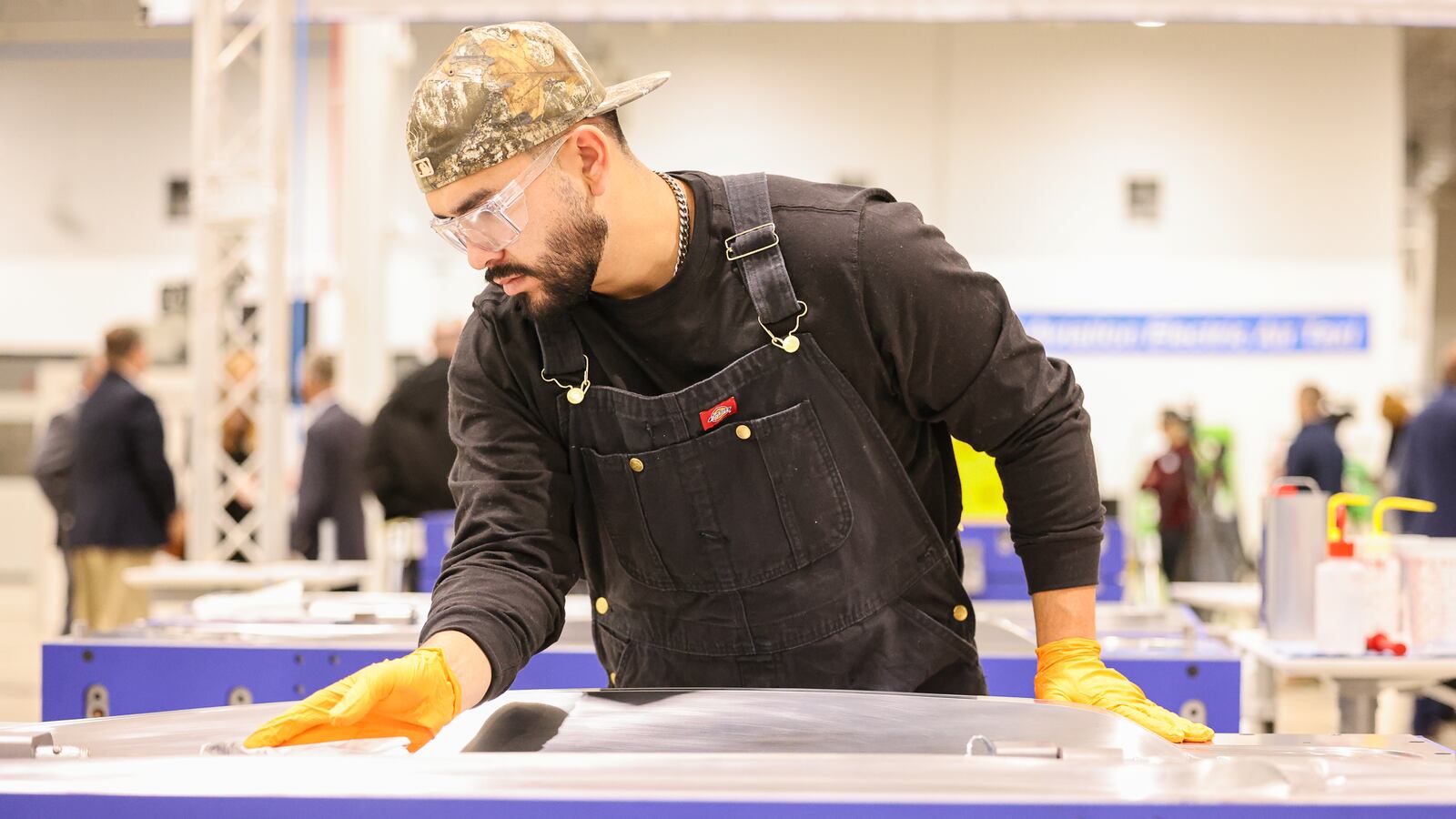 A Joby Aviation employee works in a propeller molding area at the company's new facility near Dayton International Airport on Monday, Nov. 10. BRYANT BILLING/STAFF