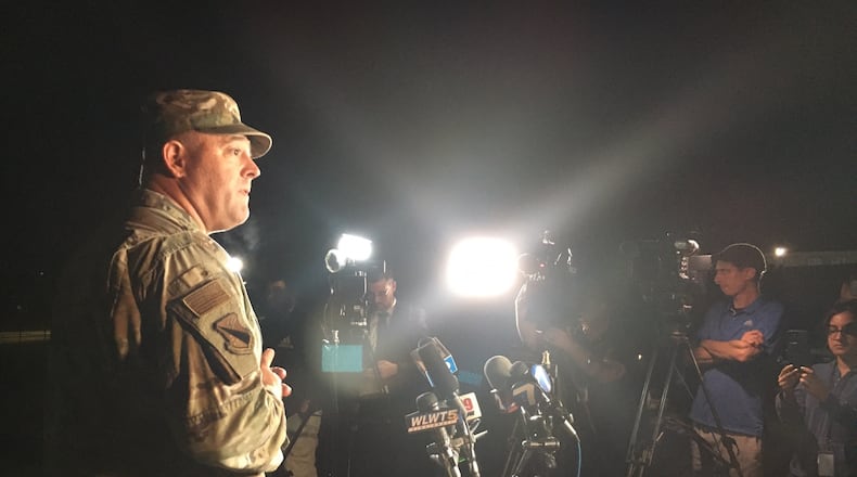 Col. Patrick MIller, commander of the 88th Air Base Wing at Wright-Patterson Air Force Base, addresses the media in a 2 a.m. press conference outside the Hope Hotel. A four-hour investigation found no active shooter on the base after an initial report. THOMAS GNAU/STAFF