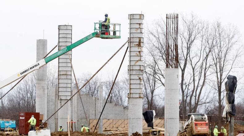 Construction continues on the new Huber Heights music center. Huber Heights officials are expected to begin negotiations on a contract this week with Music and Event Management, Inc. to manage the $18 million music center. LISA POWELL / STAFF