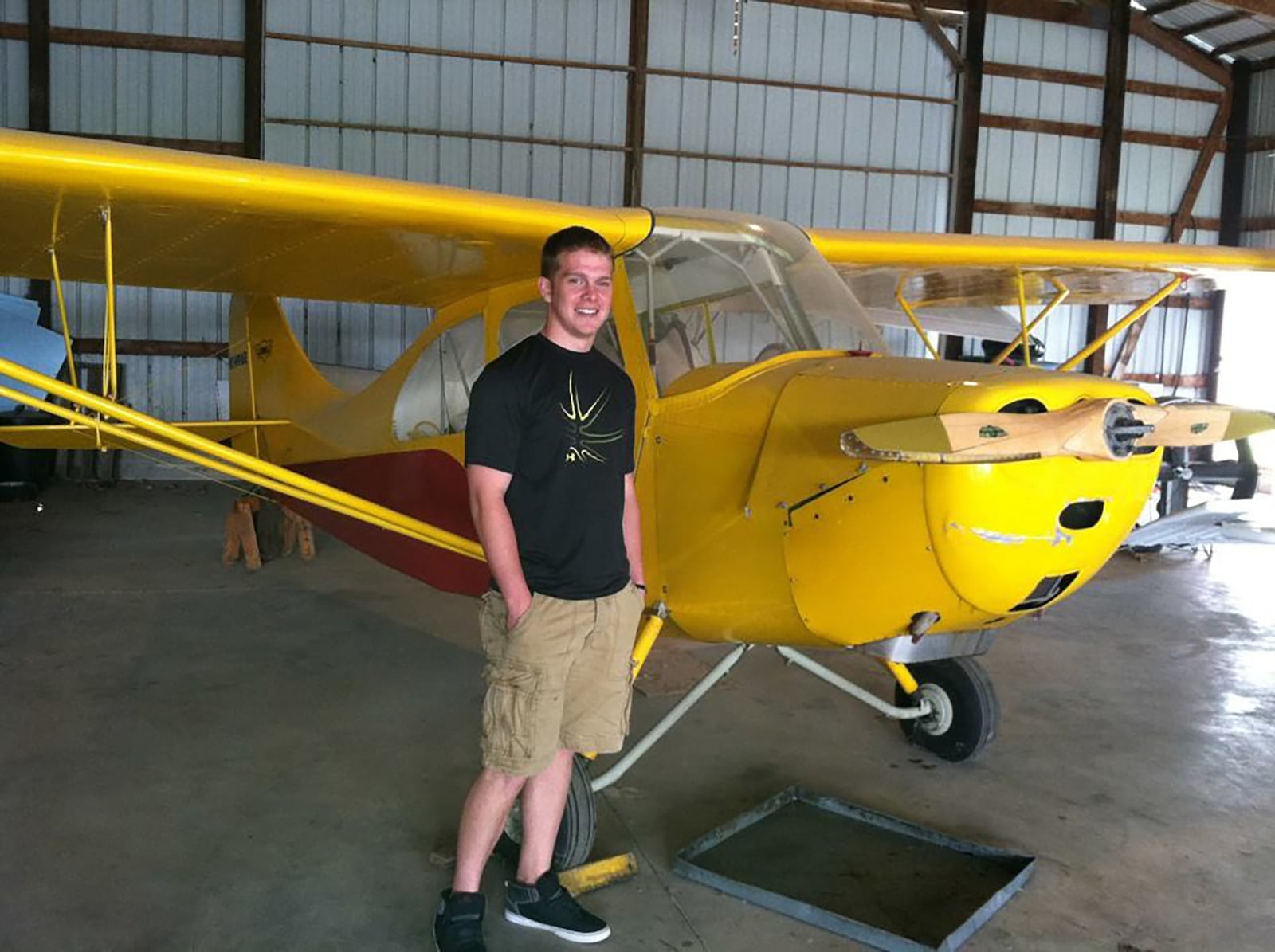 Archie Scott always dreamed of a career in aerospace, but switched gears after a diagnosis of Krohn's disease left him ineligible for a pilots license. He is shown in 2012 while still in high school with a plane he flew. CONTRIBUTED