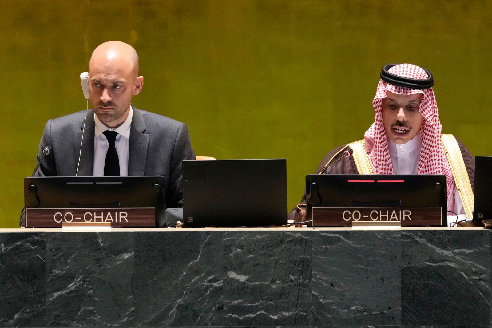 France's Foreign Minister Jean-Noel Barrot, left, and Saudi Arabia Foreign Minister Prince Faisal bin Farhan Al Saud chair the United Nations General Assembly, Monday, July 28, 2025. (AP Photo/Richard Drew)