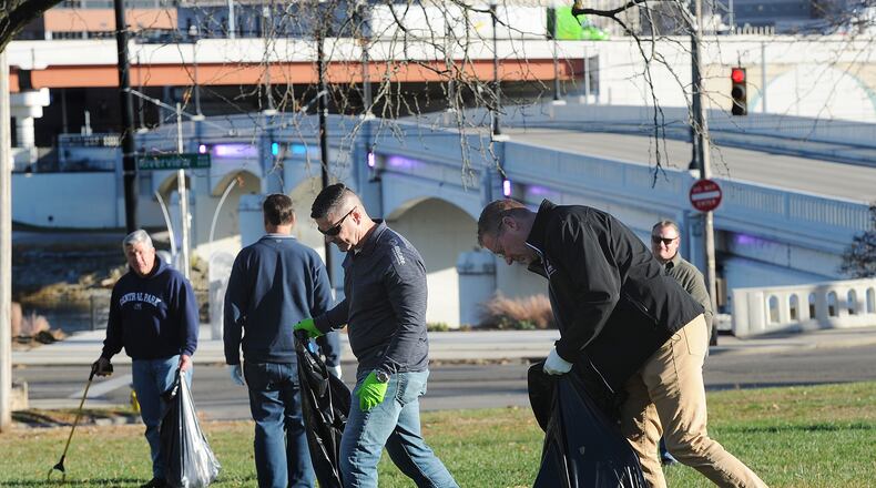 The Montgomery County Law Enforcement Memorial Association is in the process of raising funds to build a memorial at the Dayton Masonic Center at 525 W. Riverview Ave. Members of local law enforcement, both retired and active, spent time Tuesday, Nov. 14, 2023 cleaning up the site. MARSHALL GORBY\STAFF