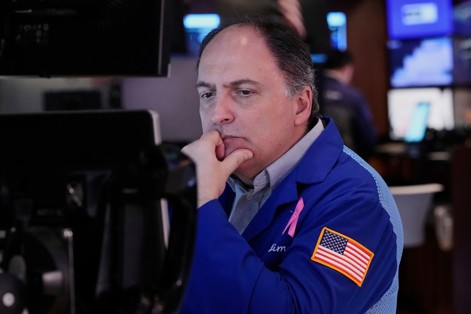 Trader James Conti works on the floor of the New York Stock Exchange, Monday, April 14, 2025. (AP Photo/Richard Drew)