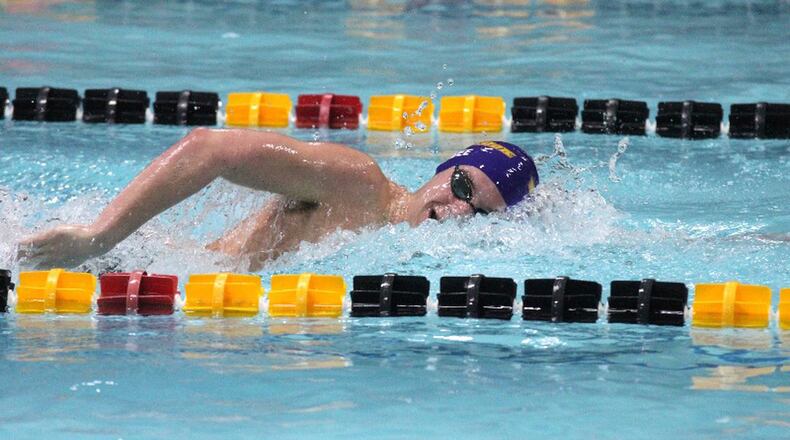 Bellbrook junior Cody Bybee with a pair of state titles in Friday’s Division II state meet in Canton. CONTRIBUTED FILE PHOTO